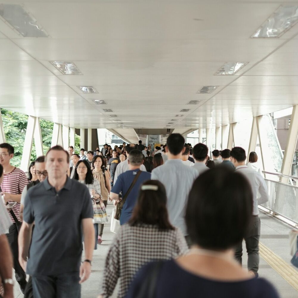 group of people walking inside building